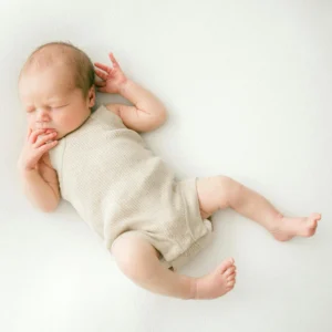 Beige  Infant  Romper  (Sleeping)