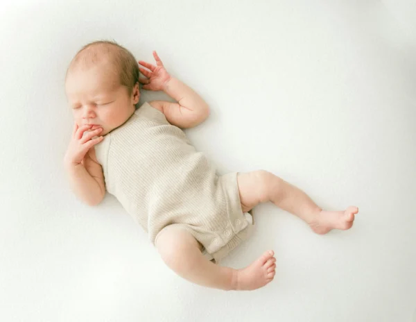 Beige  Infant  Romper  (Sleeping)